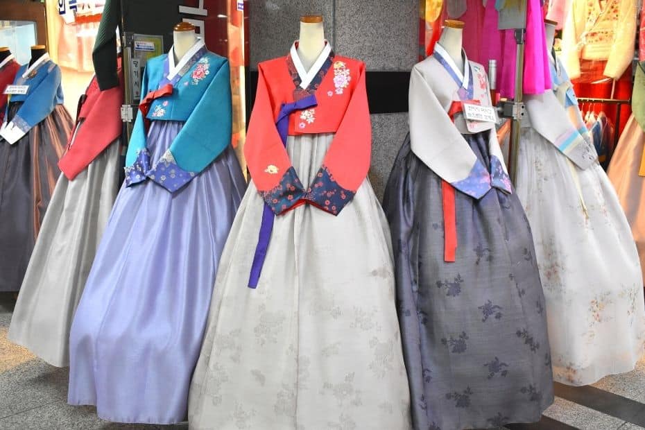 Basic Korean Phrases: 60 Useful Korean Phrases For Travel 2024 16 Selection of Korean hanbok at a traditional market