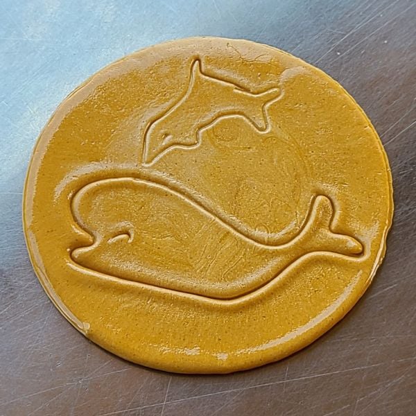 Dalgona candy with whale design Dalgona candy with whale design
