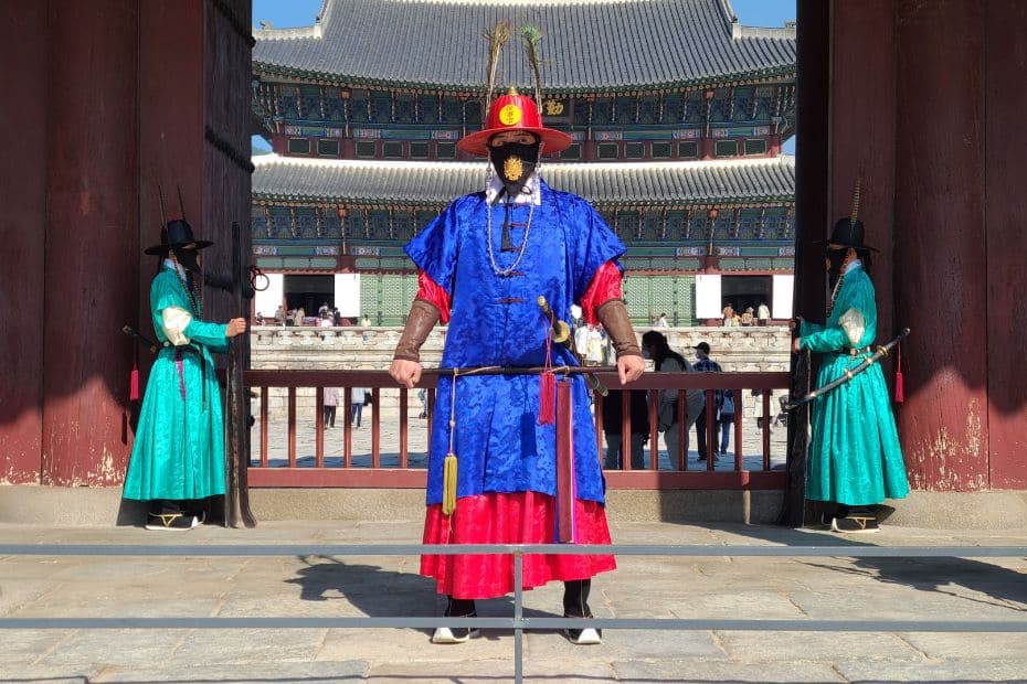 Complete South Korea Travel Guide 2024: Korean Travel Tips 6 Korean royal guard outside a palace in Seoul