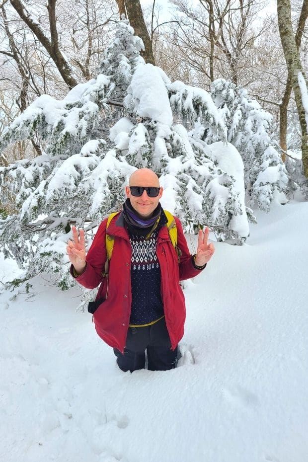 How To Hike Hallasan In Winter: Jeju Island Snow Hiking 2024 7 Joel in deep snow while hiking Hallasan Mountain in winter