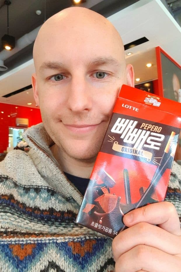 Joel with a box of Pepero Joel with a box of Pepero