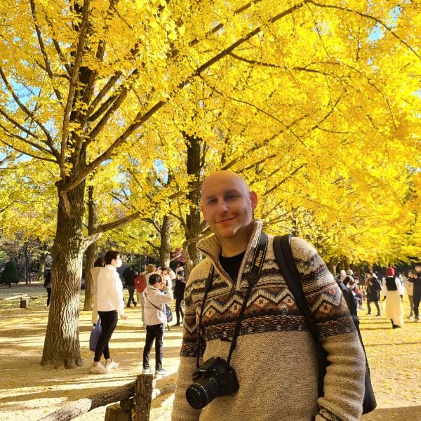 Man with Korean autumn foliage Man with Korean autumn foliage