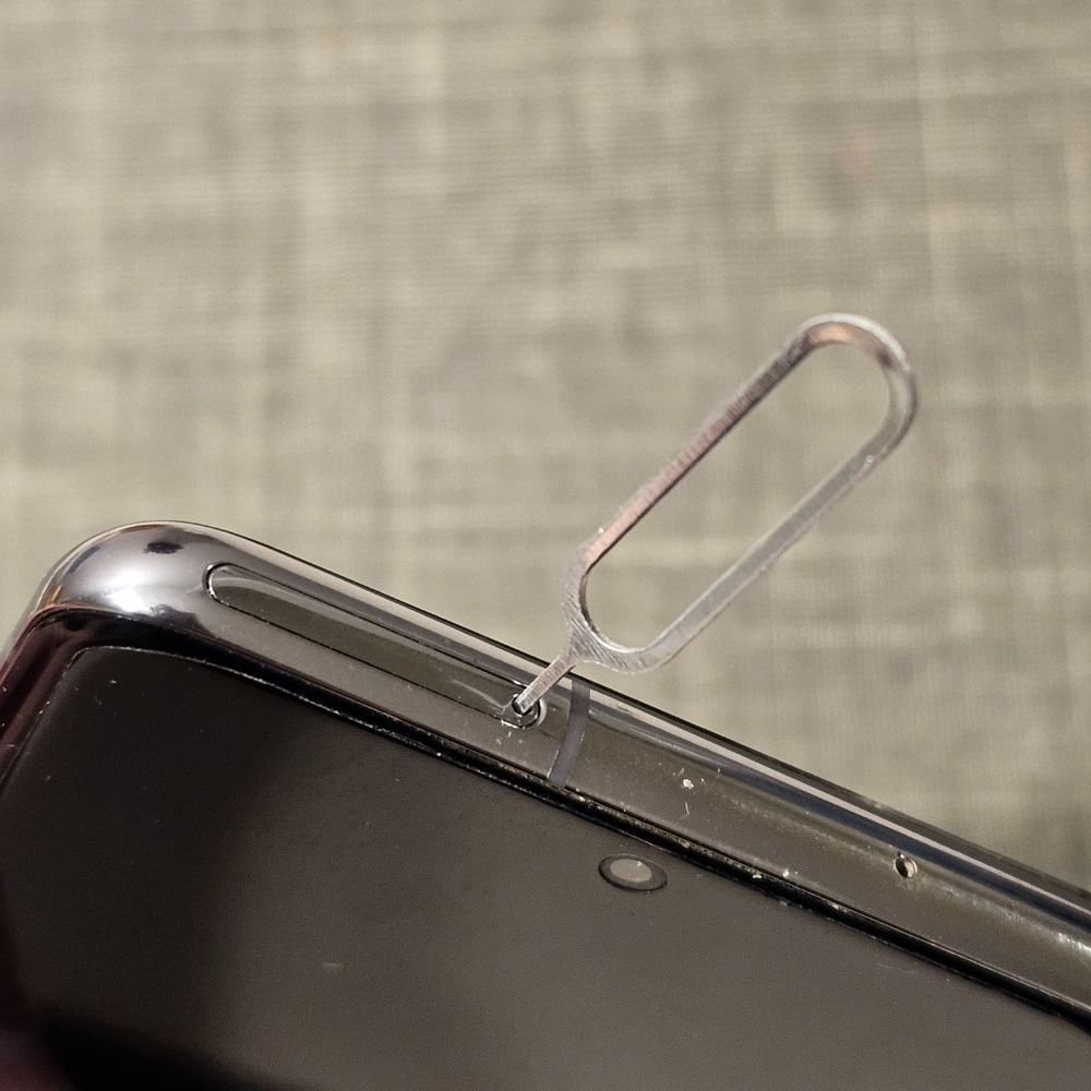 4G SK SIM Card Review: The Best Korean SIM For Tourists 2024 16 Metal hook to access SIM card