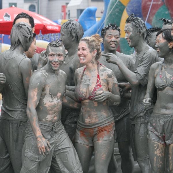 20 Cool Summer Activities In Korea: Korean Summer 2024 8 Muddy people at the Boryeong Mud Festival