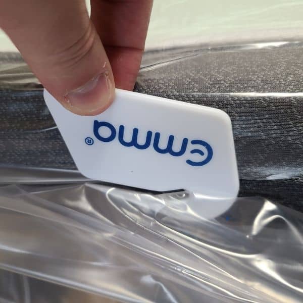 Emma Mattress Korea Review 2024: A Great Night's Sleep 10 Opening an Emma Mattress with provided cutter
