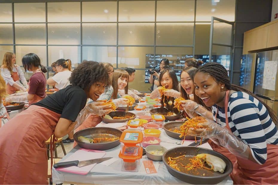 Move to Korea To Teach English: 8 Tips To Help You Settle Into Korea 15 People cooking Korean food
