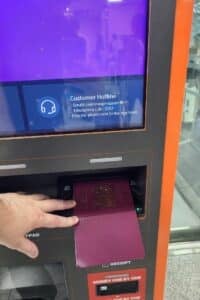WOWPASS Korea Review: How To Use WOWPASS With T-Money 2024 15 Scanning a Passport to validate identity for WOWPASS