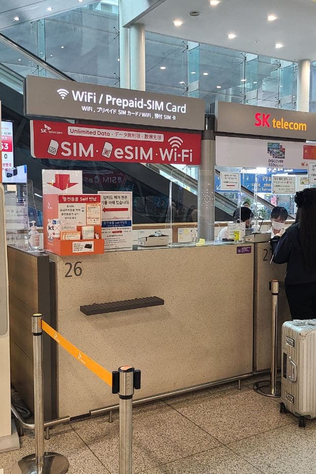 WOWPASS Korea Review: How To Use WOWPASS With T-Money 2024 38 SK Telecom Booth At Incheon Airport Terminal 1
