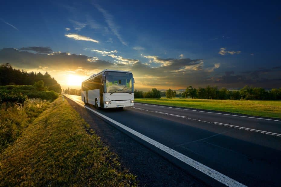 Hiking Seoraksan National Park And How To Get There 2024 7 Tour bus on a road with sunset behind
