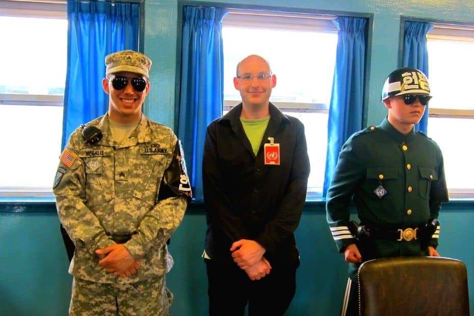 Expat Life In Korea: A Guide To Living In Korea As An Expat 8 Joel at Panmunjom Peace Village with North Korean and South Korean guards