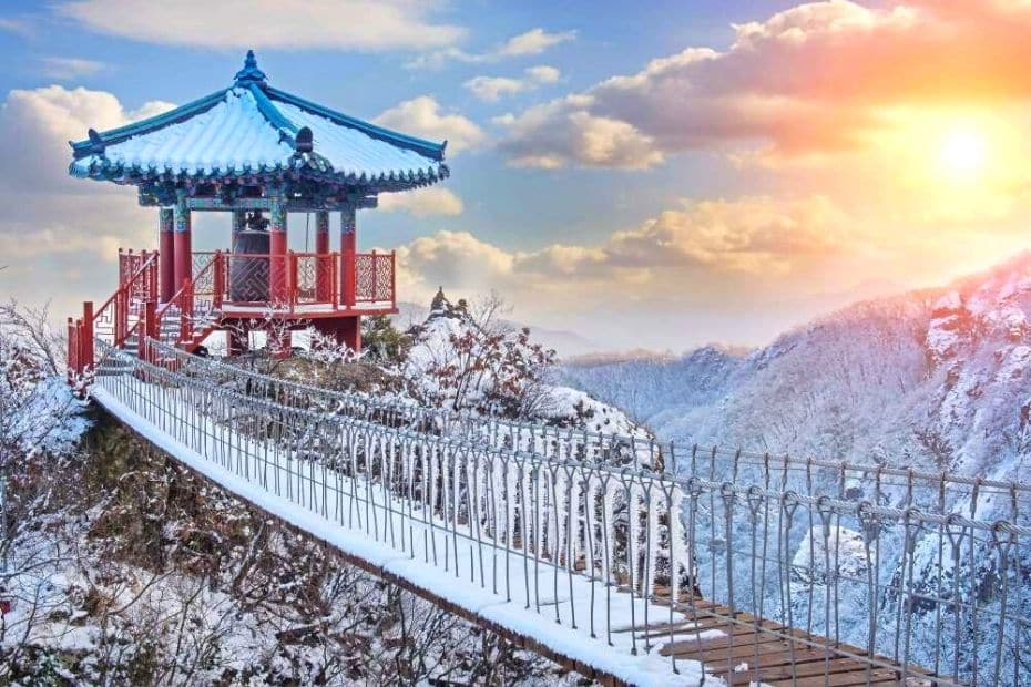 Autumn Leaves In Korea 2024: Best Korean Autumn Foliage Spots 11 Korean pagoda covered in snow in the mountains
