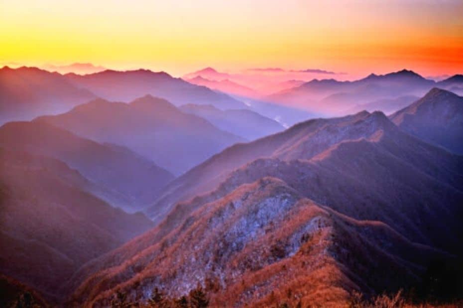 How To Go Hiking In Korea: Top Korean Hiking Tips 2024 14 Mountains in early morning sunlight
