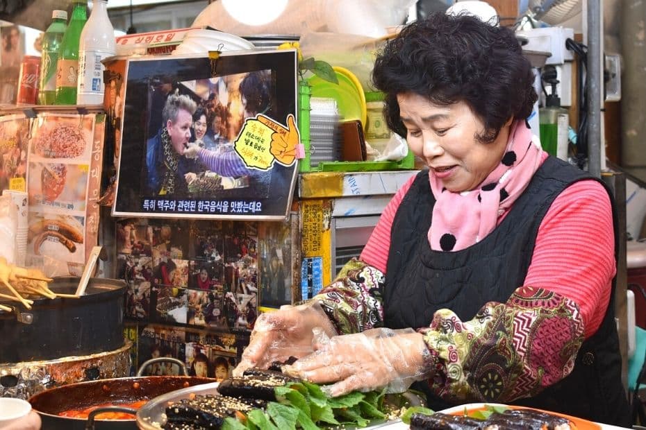 Weird Korean Foods: 15 Unique Korean Dishes You Might Love 17 Market seller in Gwangjang Market, Seoul