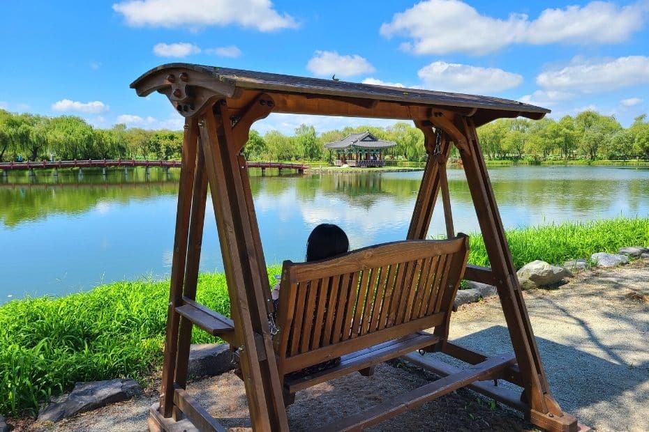 10 Things To Do In Buyeo 2024: UNESCO World Heritage City 6 Swinging chair overlooking Gungnamji Pond, Buyeo