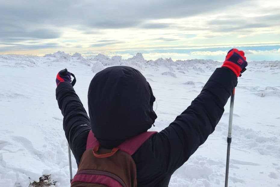 How To Hike Hallasan In Winter: Jeju Island Snow Hiking 2024 18 woman hiking Hallasan Mountain in winter