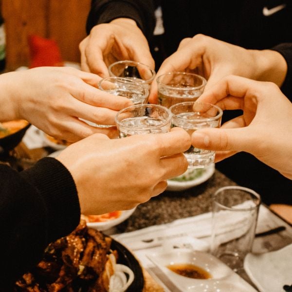 50 Unique Korean Experiences In Korea You'll Definitely Love 54 People drinking shot glasses of soju