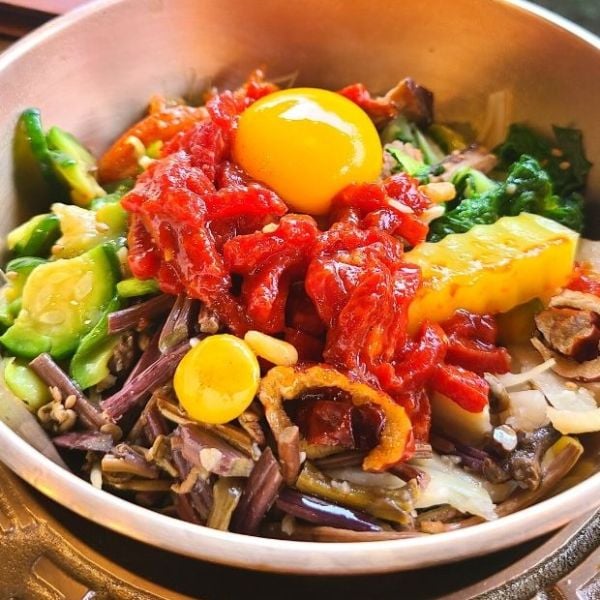 Weird Korean Foods: 15 Unique Korean Dishes You Might Love 5 Yukhoe raw beef in a bowl of bibimbap